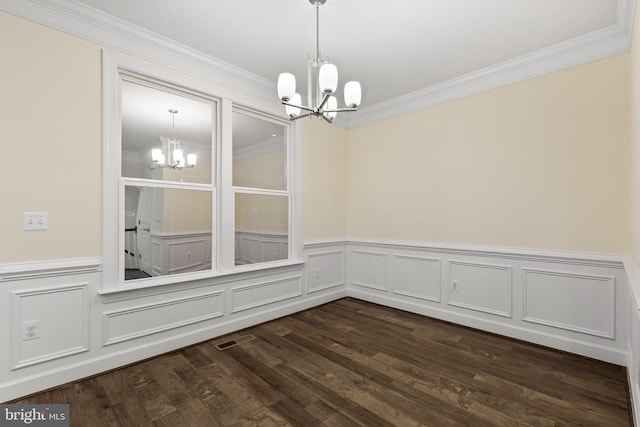 3745 Signal Knob Ct, Falls Church, VA 22041 - unfurnished dining area featuring a chandelier, crown molding, a wainscoted wall, dark wood-style floors, and a decorative wall