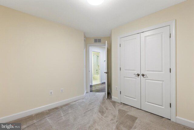 3745 Signal Knob Ct, Falls Church, VA 22041 - unfurnished bedroom featuring carpet floors, baseboards, and a closet