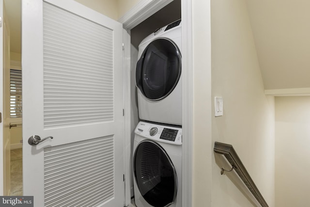 3745 Signal Knob Ct, Falls Church, VA 22041 - clothes washing area with stacked washer and clothes dryer and baseboards