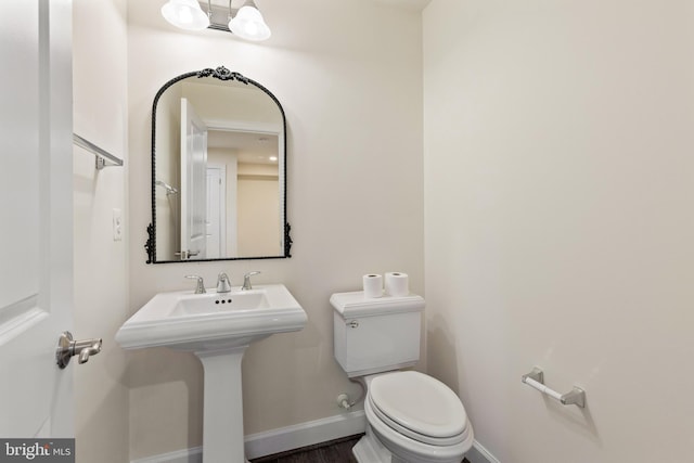 3745 Signal Knob Ct, Falls Church, VA 22041 - half bath featuring baseboards, toilet, and a sink