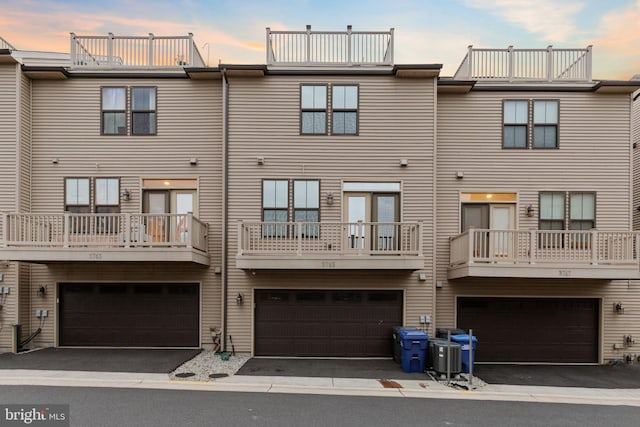 3745 Signal Knob Ct, Falls Church, VA 22041 - back of house featuring an attached garage and central AC