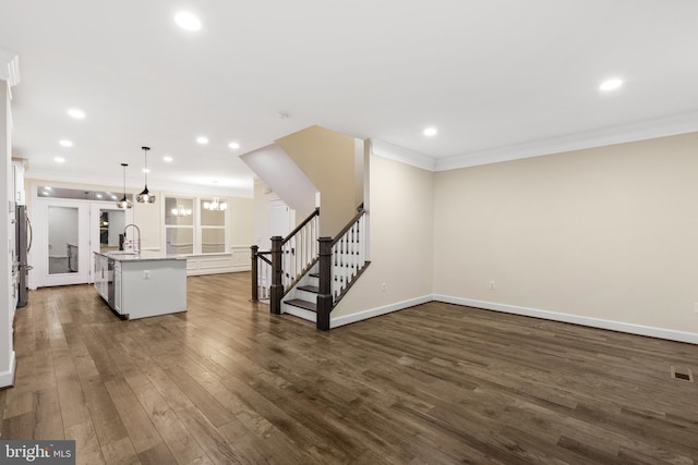 3745 Signal Knob Ct, Falls Church, VA 22041 - unfurnished living room featuring ornamental molding, stairway, dark wood-type flooring, baseboards, and recessed lighting