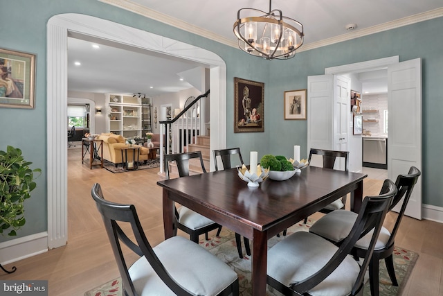 3175 21st St N, Arlington, VA 22201 - dining room with ornamental molding, light wood-type flooring, baseboards, stairway, and a notable chandelier