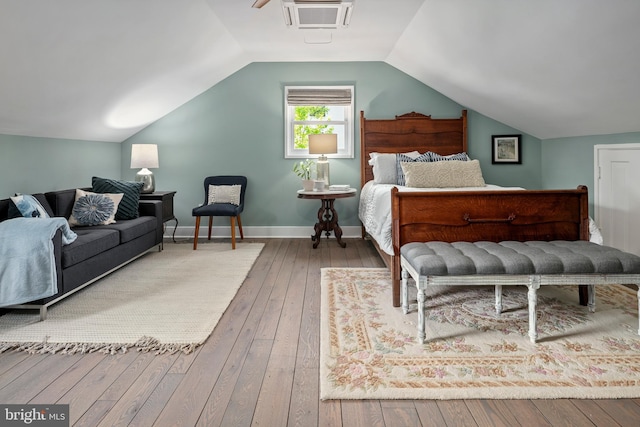 3175 21st St N, Arlington, VA 22201 - bedroom with vaulted ceiling, wood-type flooring, and baseboards