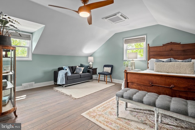 3175 21st St N, Arlington, VA 22201 - bedroom featuring vaulted ceiling, hardwood / wood-style floors, visible vents, and multiple windows