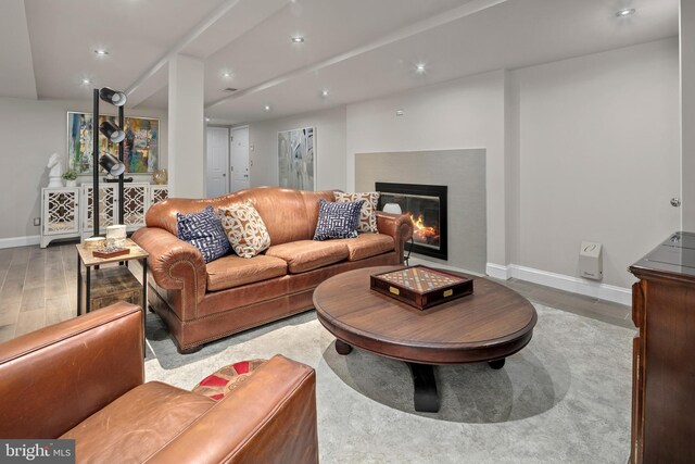 3175 21st St N, Arlington, VA 22201 - living area featuring wood finished floors, baseboards, a glass covered fireplace, and recessed lighting