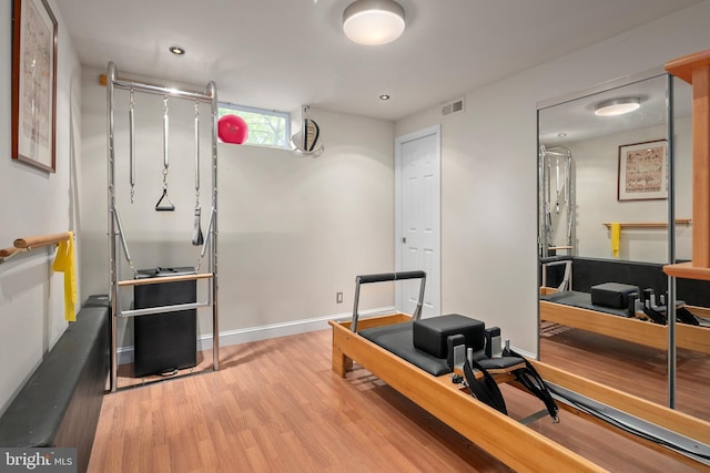 3175 21st St N, Arlington, VA 22201 - exercise room with baseboards, visible vents, and wood finished floors