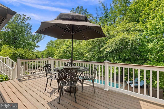 3175 21st St N, Arlington, VA 22201 - wooden terrace with outdoor dining area and an outdoor pool