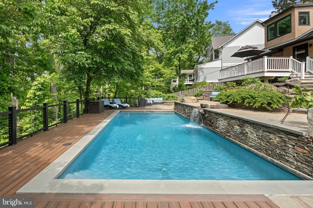 3175 21st St N, Arlington, VA 22201 - view of pool with a wooden deck, outdoor lounge area, a fenced in pool, and fence