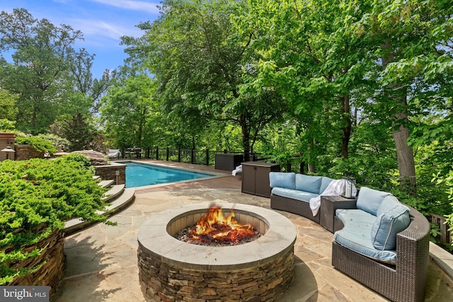 3175 21st St N, Arlington, VA 22201 - view of pool with an outdoor living space with a fire pit, a patio, and a fenced in pool