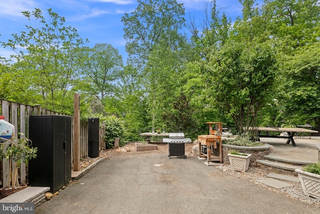 3175 21st St N, Arlington, VA 22201 - view of patio featuring fence and a grill