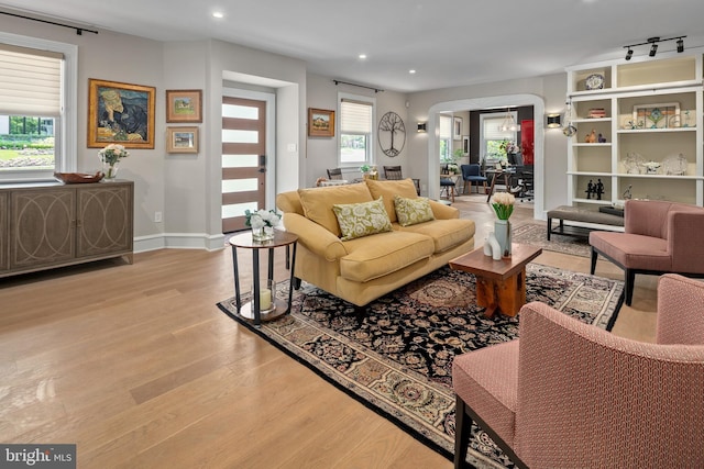 3175 21st St N, Arlington, VA 22201 - living area with arched walkways, recessed lighting, baseboards, and light wood-type flooring