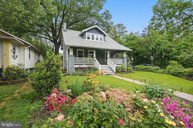 8118 Flower Ave, Takoma Park, MD 20912 - bungalow-style house featuring a porch, a chimney, and a front yard