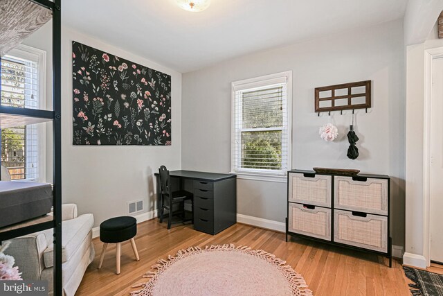 6226 Long Meadow Dr, Sykesville, MD 21784 - home office with wood finished floors, plenty of natural light, and baseboards