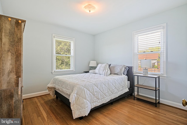 6226 Long Meadow Dr, Sykesville, MD 21784 - bedroom with wood-type flooring and baseboards
