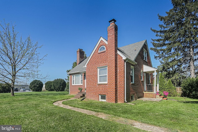 6226 Long Meadow Dr, Sykesville, MD 21784 - view of side of home with a chimney, a yard, brick siding, and a shingled roof