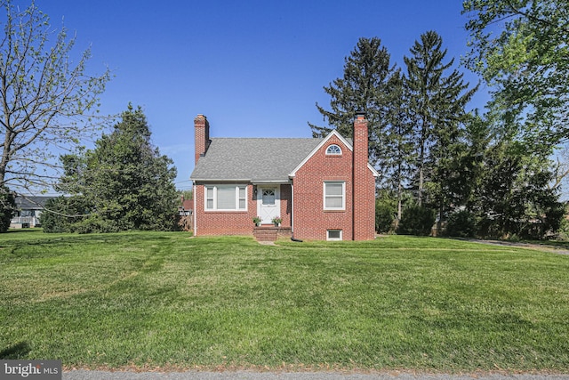 6226 Long Meadow Dr, Sykesville, MD 21784 - view of front of property featuring a chimney, brick siding, and a front lawn
