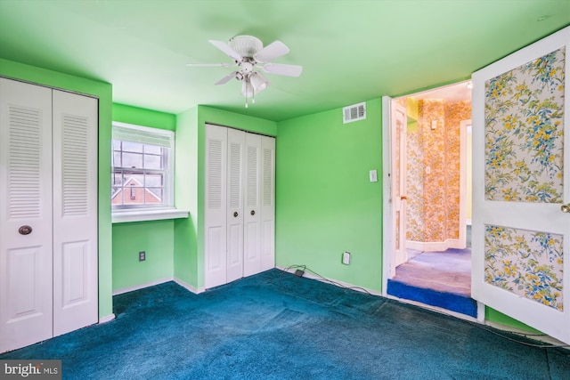 4307 39th Pl, Brentwood, MD 20722 - unfurnished bedroom with carpet flooring, a ceiling fan, multiple closets, visible vents, and baseboards
