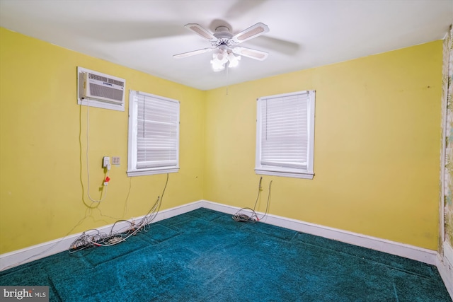 4307 39th Pl, Brentwood, MD 20722 - empty room featuring dark colored carpet, baseboards, a wall unit AC, and a ceiling fan