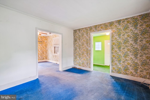 4307 39th Pl, Brentwood, MD 20722 - carpeted spare room featuring a wall mounted AC, wallpapered walls, baseboards, and ornamental molding