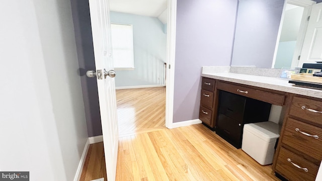 246 Choptank Rd, Stafford, VA 22556 - bathroom featuring wood finished floors, baseboards, and vanity