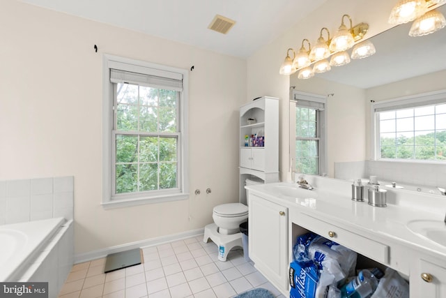100 Lucy Long Ct, Stephens City, VA 22655 - full bath featuring a bath, tile patterned flooring, toilet, baseboards, and double vanity