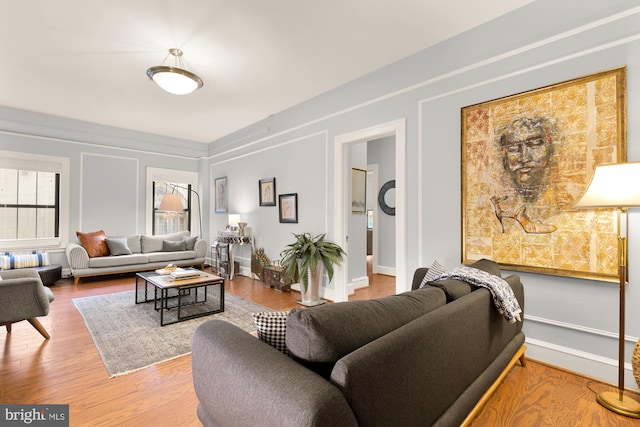 1613 Harvard St NW Unit 105, Washington, DC 20009 - living room with wood finished floors and baseboards