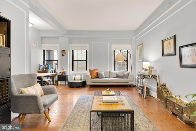 1613 Harvard St NW Unit 105, Washington, DC 20009 - living room featuring wood finished floors