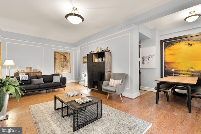 1613 Harvard St NW Unit 105, Washington, DC 20009 - living area with light wood-style floors