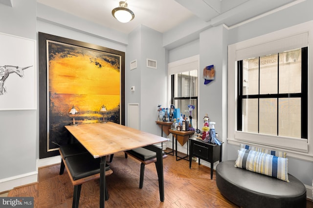 1613 Harvard St NW Unit 105, Washington, DC 20009 - dining room with wood finished floors and baseboards