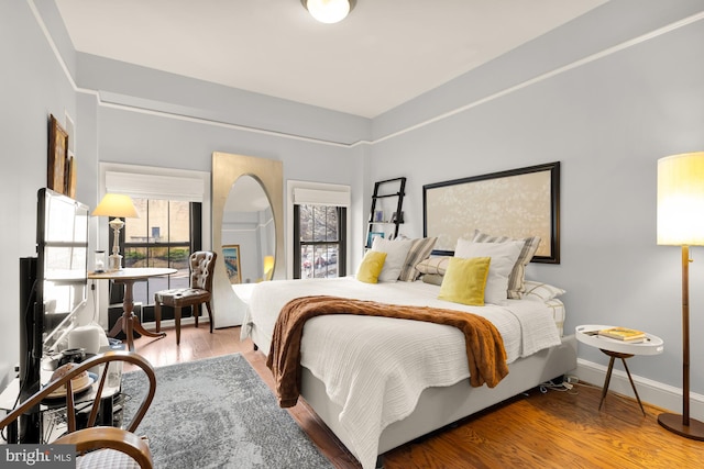 1613 Harvard St NW Unit 105, Washington, DC 20009 - bedroom featuring wood finished floors and baseboards