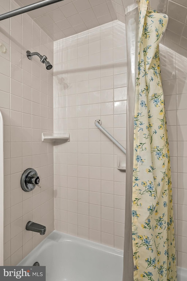full bath featuring shower / bathtub combination with curtain