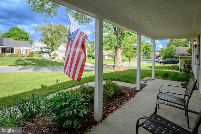 view of patio with a residential view and covered porch