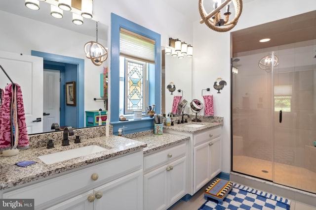23593 Robalo Rd, Frankford, DE 19945 - full bath with a chandelier, a shower stall, and vanity
