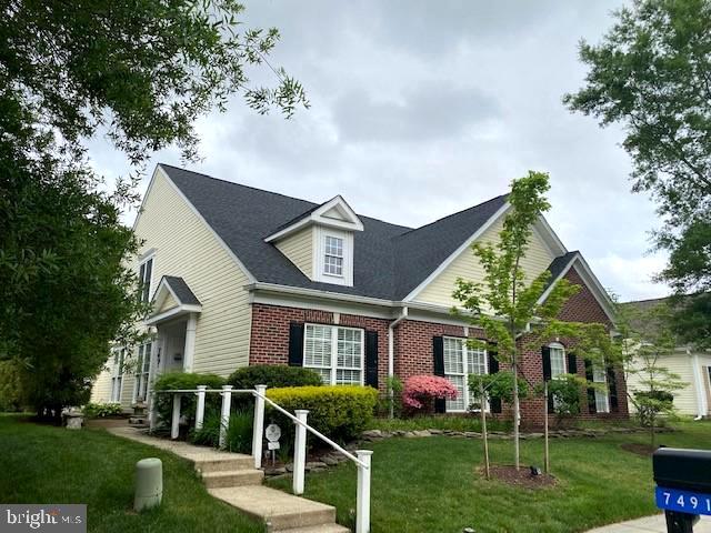 7491 Casey Ave, Easton, MD 21601 - view of front of home featuring brick siding and a front yard
