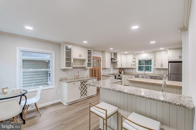 6488 Davis Ford Rd, Manassas, VA 20111 - kitchen with appliances with stainless steel finishes, open shelves, a sink, white cabinets, and ornamental molding