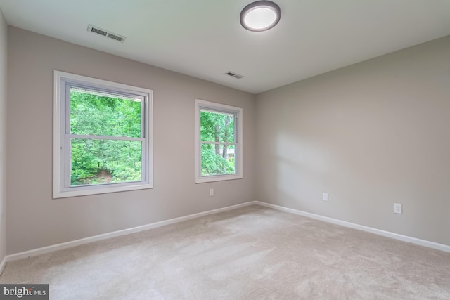 6488 Davis Ford Rd, Manassas, VA 20111 - empty room featuring baseboards and light carpet