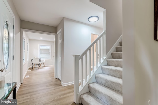 6488 Davis Ford Rd, Manassas, VA 20111 - staircase with wood finished floors and baseboards