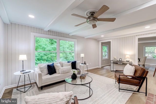 6488 Davis Ford Rd, Manassas, VA 20111 - living room with light wood finished floors, beam ceiling, ceiling fan, and baseboards