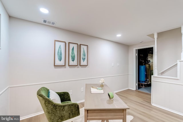 6488 Davis Ford Rd, Manassas, VA 20111 - living area featuring wood finished floors, a desk, recessed lighting, and a wainscoted wall