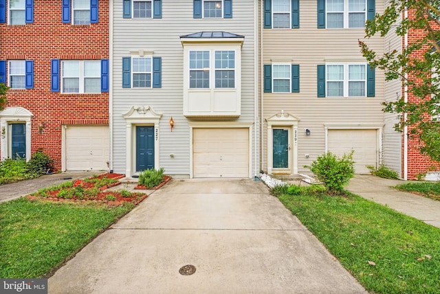 view of property with concrete driveway