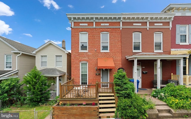 1307 Morling Ave, Baltimore, MD 21211 - view of front facade with brick siding and covered porch