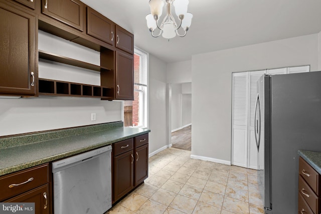 1307 Morling Ave, Baltimore, MD 21211 - kitchen with stainless steel appliances, dark countertops, a chandelier, open shelves, and dark brown cabinets