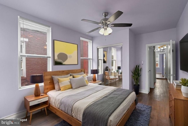 1307 Morling Ave, Baltimore, MD 21211 - bedroom featuring baseboards, wood finished floors, and a ceiling fan