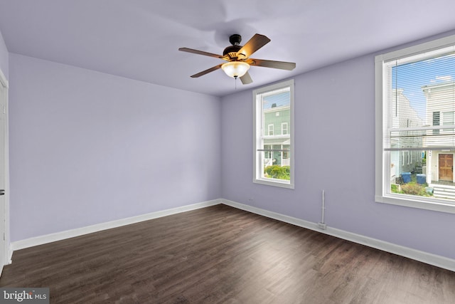 1307 Morling Ave, Baltimore, MD 21211 - unfurnished room with plenty of natural light, dark wood-style flooring, and ceiling fan