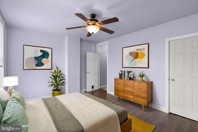 1307 Morling Ave, Baltimore, MD 21211 - bedroom with baseboards, wood finished floors, and ceiling fan