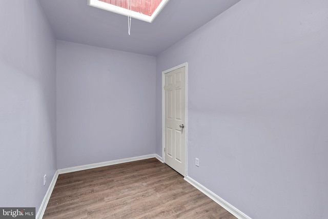1307 Morling Ave, Baltimore, MD 21211 - unfurnished room featuring wood finished floors and baseboards