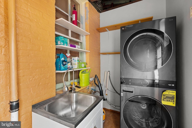 1307 Morling Ave, Baltimore, MD 21211 - laundry room featuring stacked washing machine and dryer