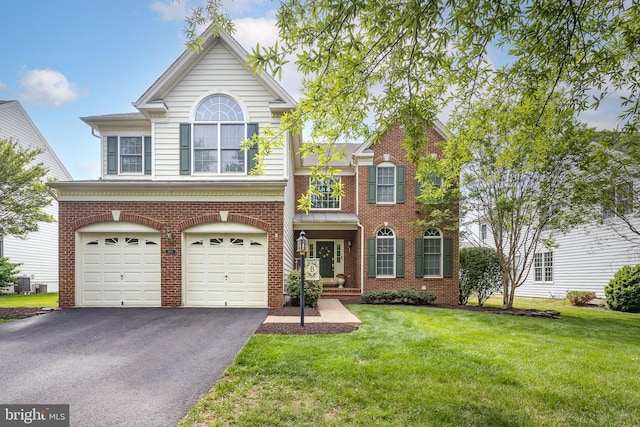 view of front of house with a garage, a front lawn, central AC unit, brick siding, and driveway