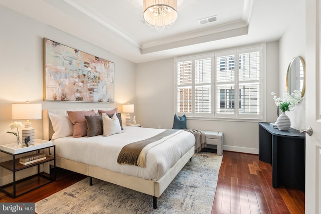 44521/2 Macarthur Blvd NW, Washington, DC 20007 - bedroom featuring a raised ceiling, dark wood-type flooring, a chandelier, baseboards, and crown molding
